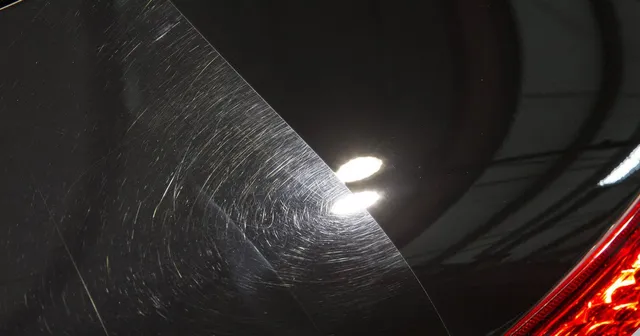 Paint correction before and after comparison showing swirl marks removed and mirror finish restored